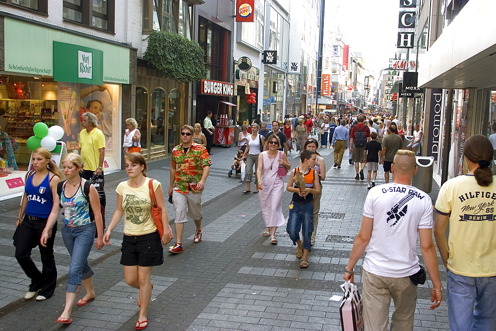 People walking in Hohe strasse, a pedestrian street with many shop and restaurants in the city center, Cologne, North Rhine Westphalia, Germany, Europe