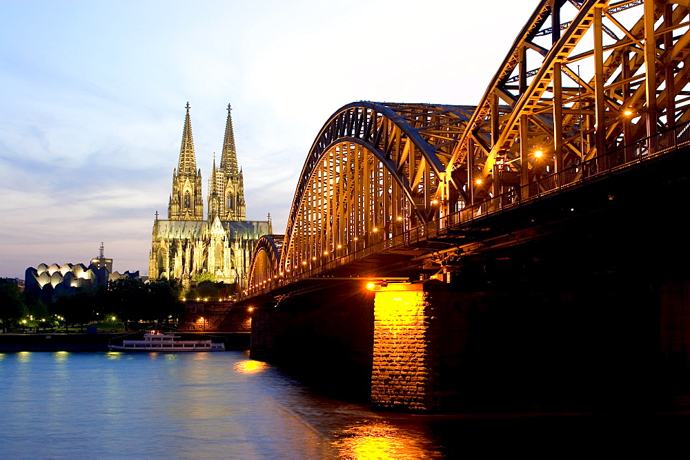 Cologne cathedral and Hohenzollern bridge at night, Cologne, North Rhine Westphalia, Germany, Europe