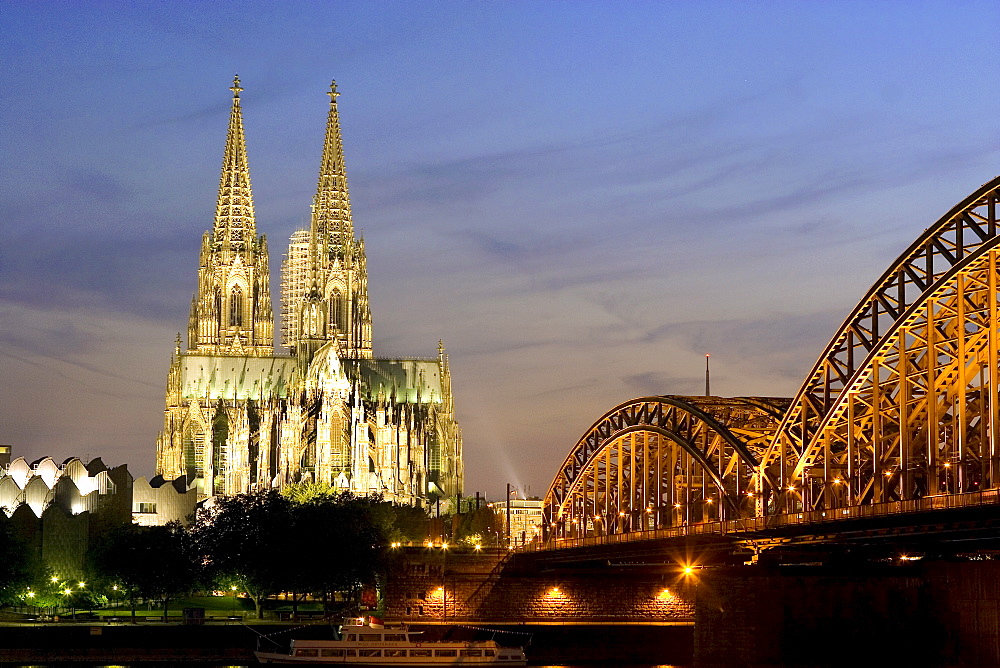 Cologne cathedral, UNESCO World Heritage Site, and Hohenzollern bridge at night, Cologne, North Rhine Westphalia, Germany, Europe