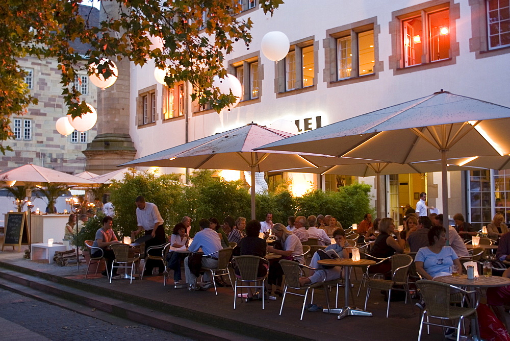 People sitting at an outdoors cafe, Stuttgart, Baden Wurttemberg, Germany, Europe