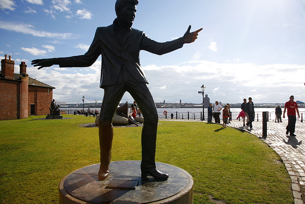 The statue of Billy Fury by Albert Dock and the Mersey River, Liverpool, Merseyside, England, United Kingdom, Europe