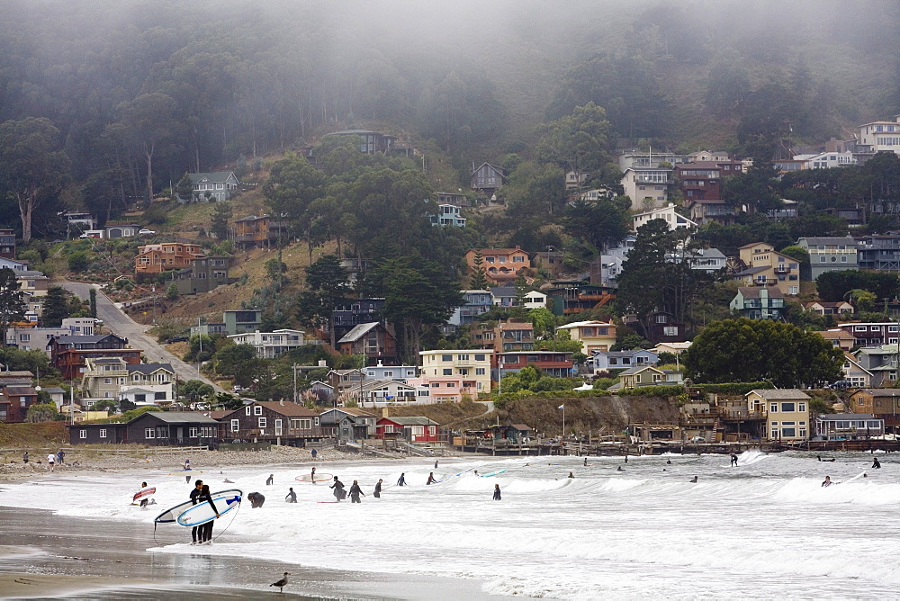 Surfers at Linda Mar beach, Pacifica, California, United States of America, North America