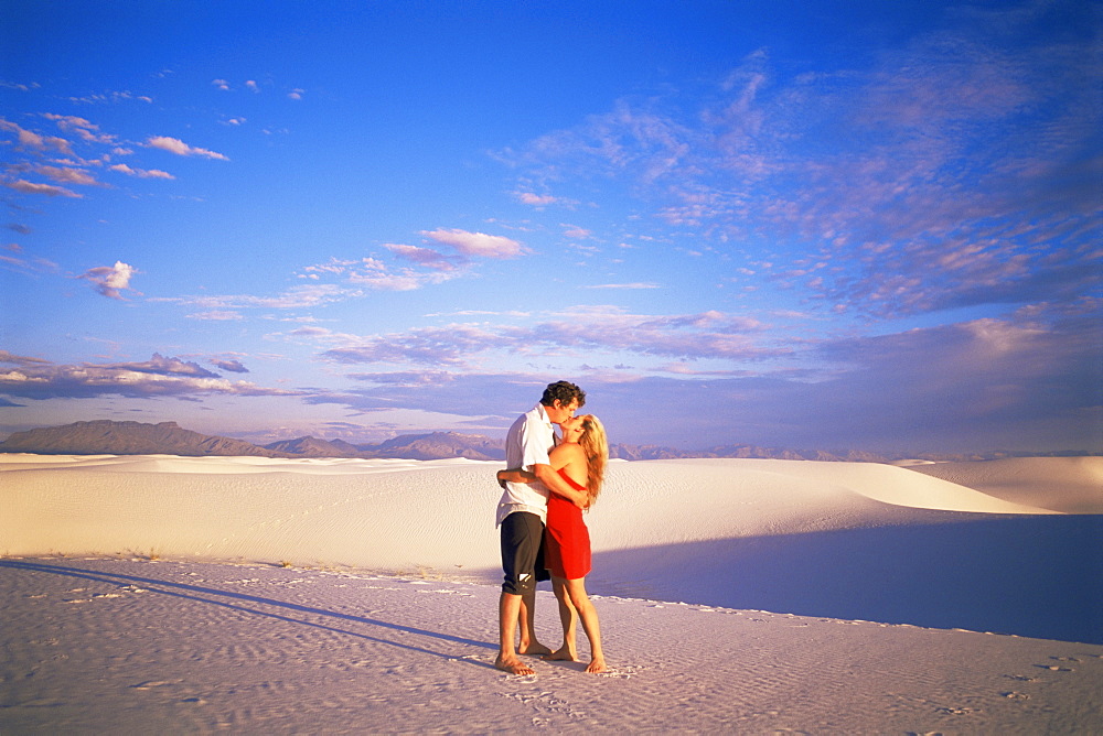 Couple kissing, White Sands National Monument, New Mexico, United States of America, North America