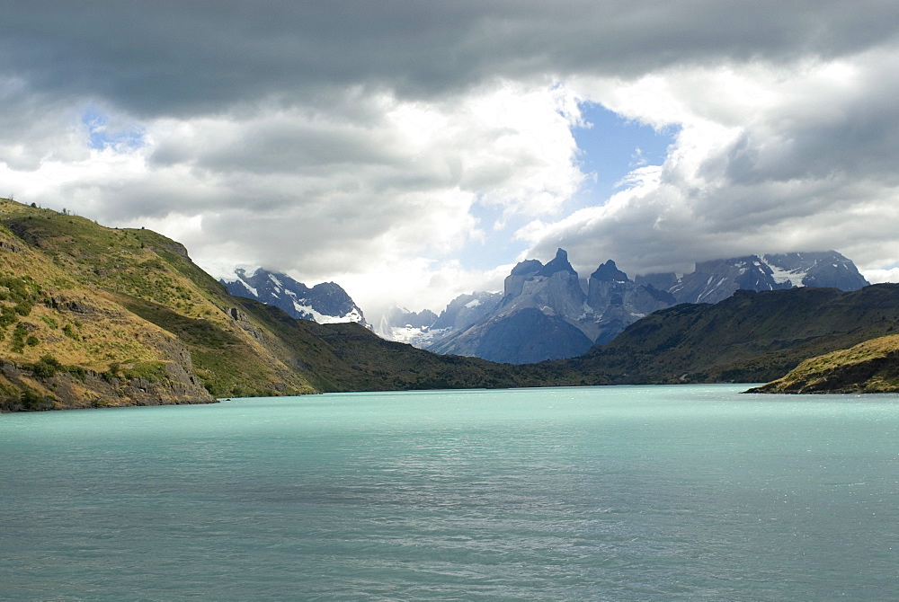 The two towers stand in front of Rio Paine in Torres del Paine National Park, Chile, South America