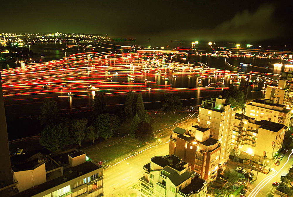 Boats streak across the bay after firework display, Vancouver, British Columbia (B.C.), Canada, North America