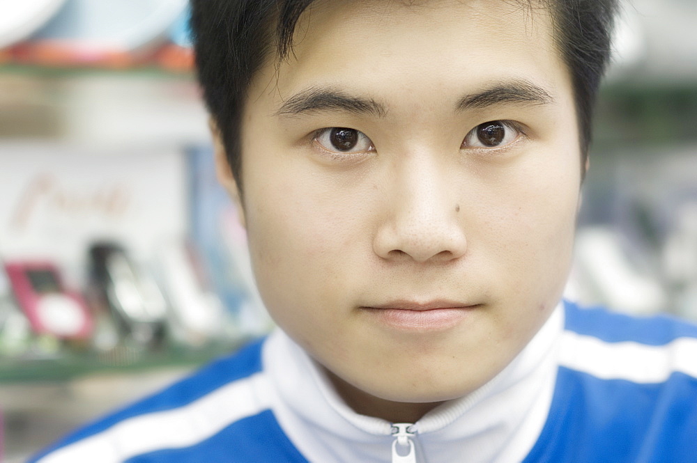 Portrait of young Chinese man, Hong Kong, China, Asia