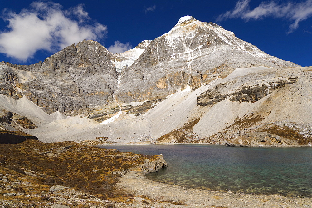 Dauzhengcuo Lake (Five Color lake) and Xiannairi mountain, Yading Nature Reserve, Sichuan Province, China, Asia