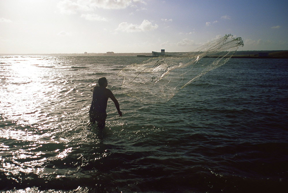 Fisherman casting net, Cuba, West Indies, Central America