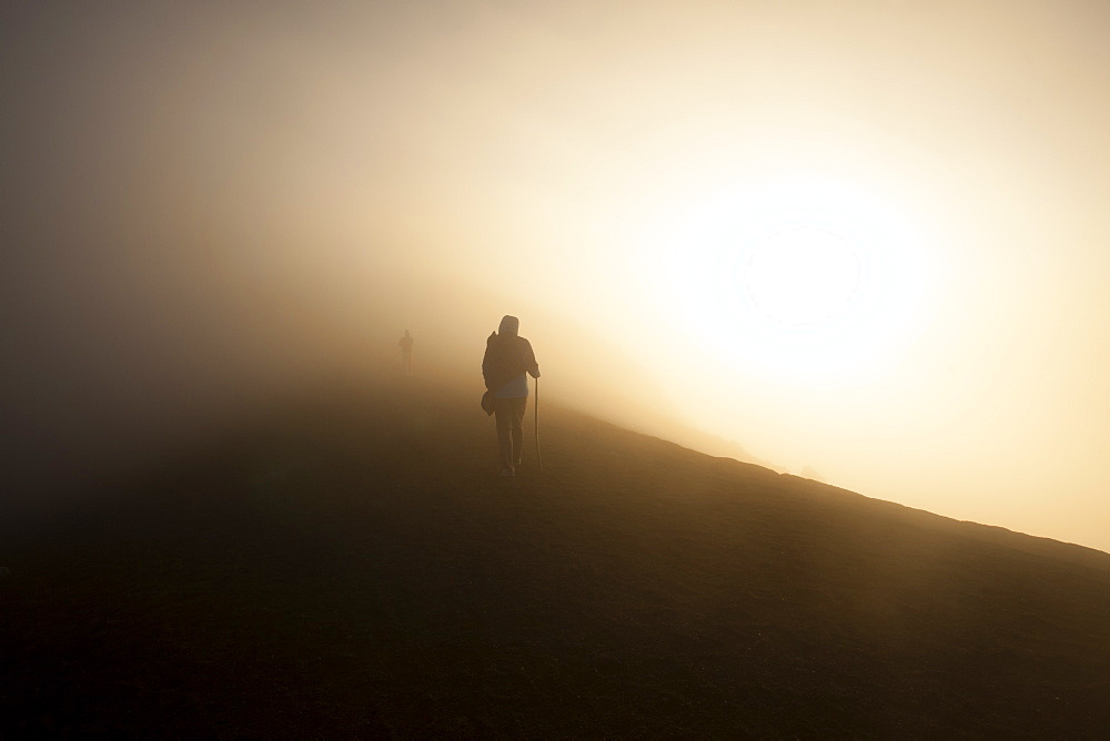 Woman walking on the summit of Volcan Acatenango, Guatemala, Central America