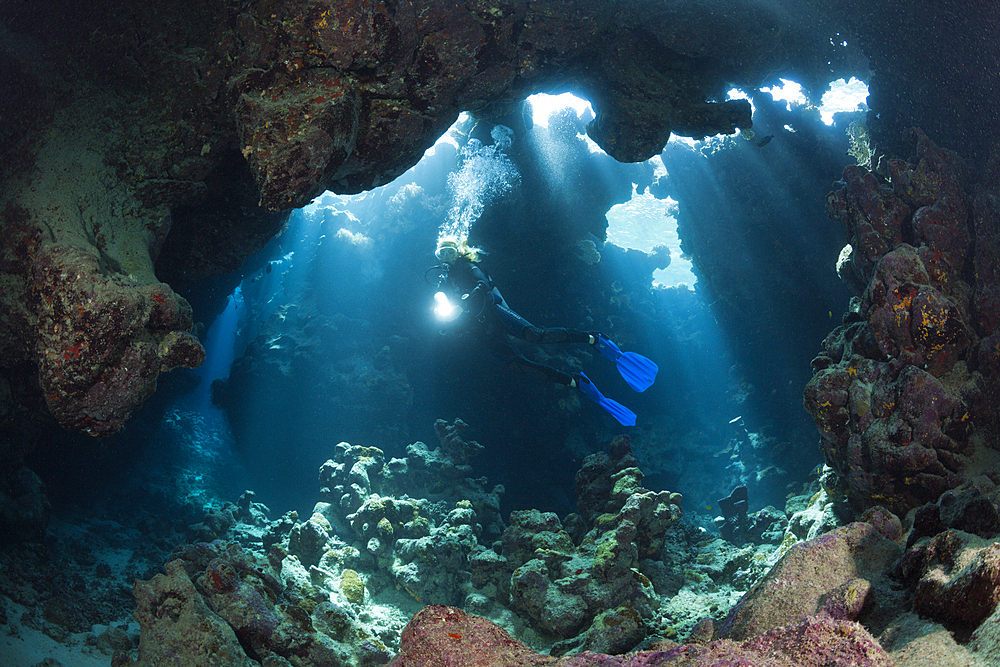 Scuba Diver inside Cave, Cave Reef, Red Sea, Egypt