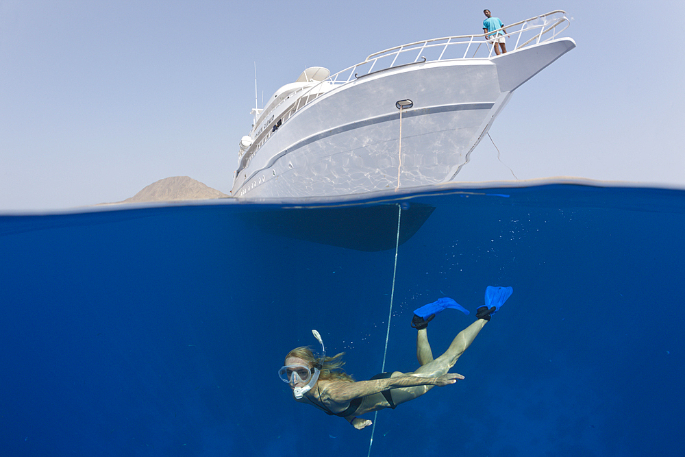 Snorkeler and Liveaboard, Zabargad, Red Sea, Egypt