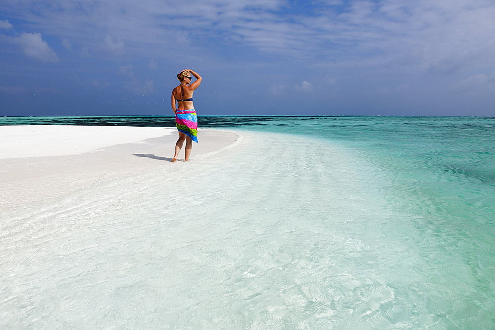 Female Tourist on Sand Bank, Felidhu Atoll, Maldives