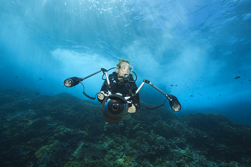 Scuba diver in surf zone, Christmas Island, Australia