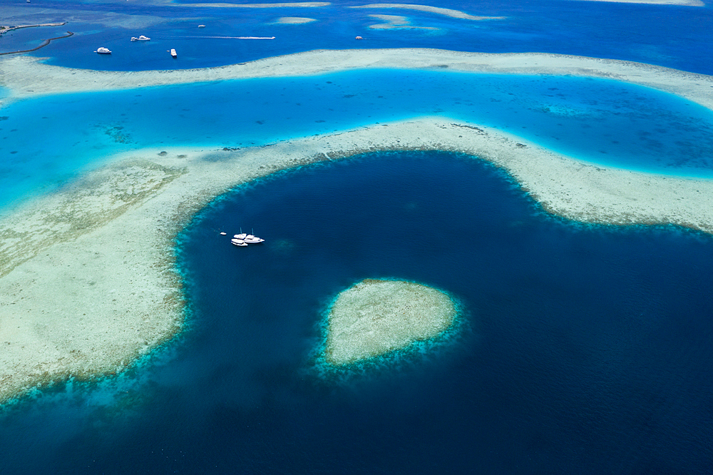 Liveaboards anchoring in Guraidhoo Lagoon, South Male Atoll, Indian Ocean, Maldives