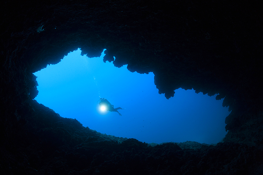 Scuba Diver inside Green Cave, Vis Island, Mediterranean Sea, Croatia