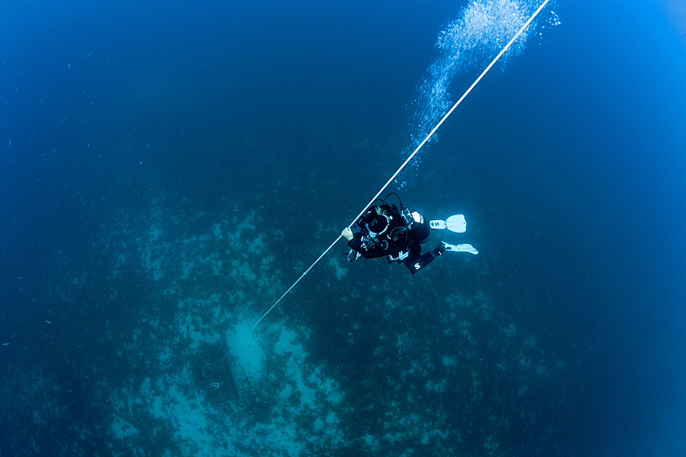 Scuba Diver doing safety stop, Vis Island, Mediterranean Sea, Croatia