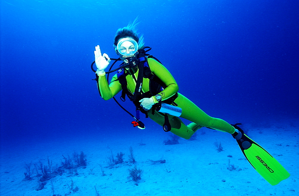 Scuba diver shows o.K. signal, Bahamas, Caribbean Sea, Grand Bahama Island