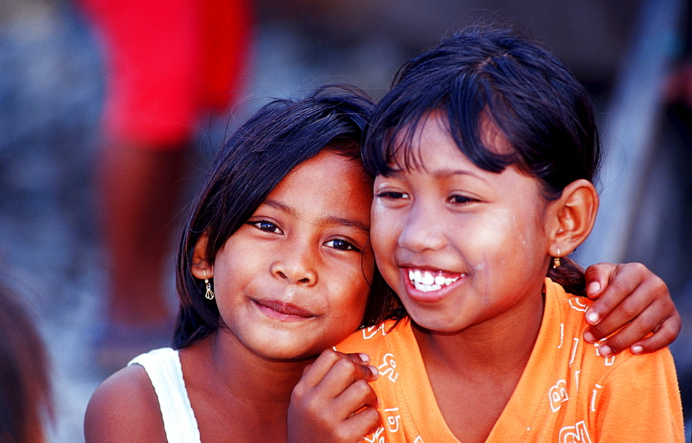 Two indonesian girl, Indonesia, Sulawesi, Celebes, Fishing village Lamanggau