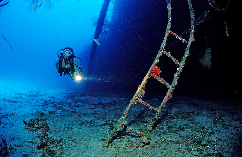 Scuba diver on the Hilma Hooker Ship Wreck, Netherlands Antilles, Bonaire, Caribbean Sea