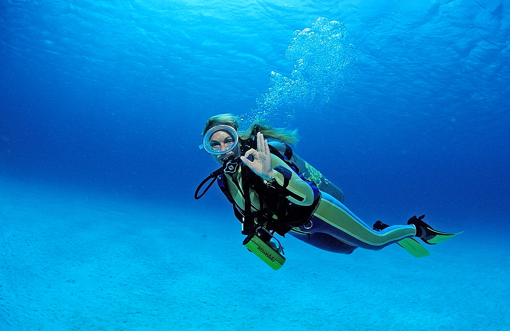 Scuba diver shows o.K. signal, Netherlands Antilles, Bonaire, Caribbean Sea