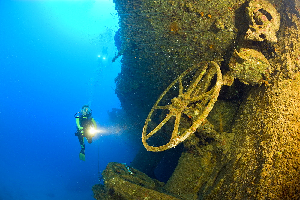 Diver explores Wheels and Wreckage of HIJMS Nagato Battleship, Marshall Islands, Bikini Atoll, Micronesia, Pacific Ocean