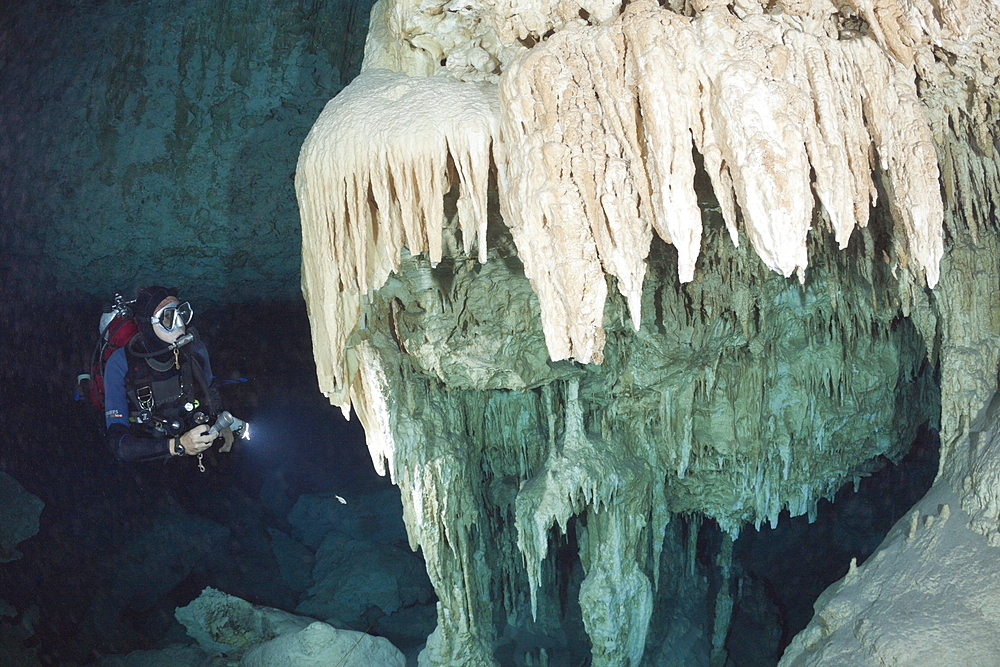 Scuba diver in Bat Cave Cenote, Playa del Carmen, Yucatan Peninsula, Mexico