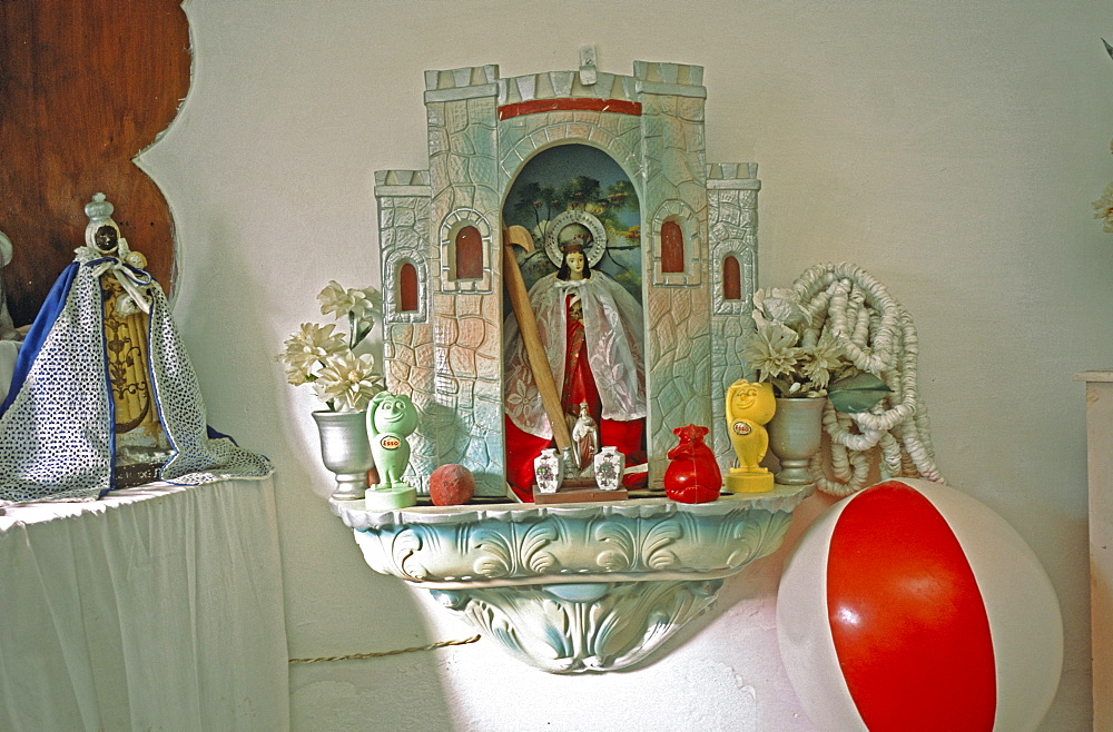 Charms and objects placed on a Santeria altar in a home in the Los Pinos area of Havana, Cubo