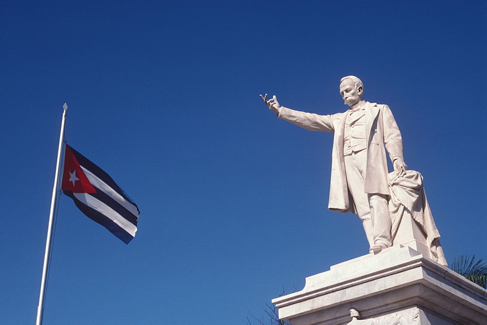 A statue of Jose Marti (poet and martyr of the Cuban independence movement) in the Plaza Marti in the town of Cienfuegos, Cienfuegos Province, Cuba