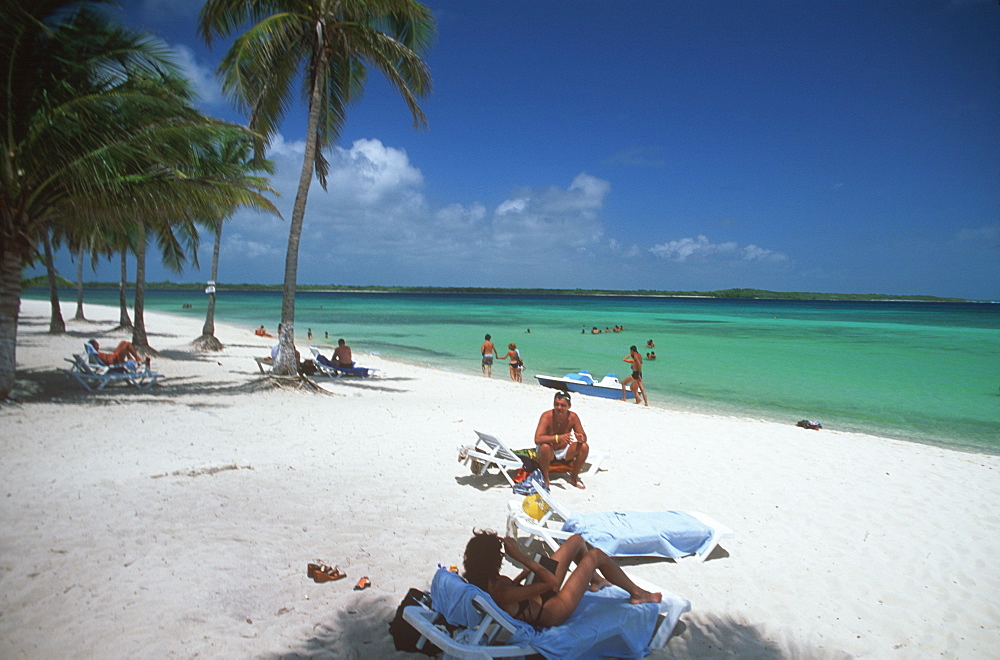 Sunbathers and tourists on beach near resorts, Playa los Cocos, Santa Lucia, Camaguey Province, Cuba