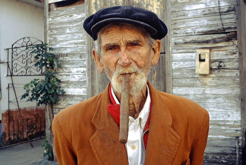 Portrait of an elderly man with a Cuban cigar, Cuba