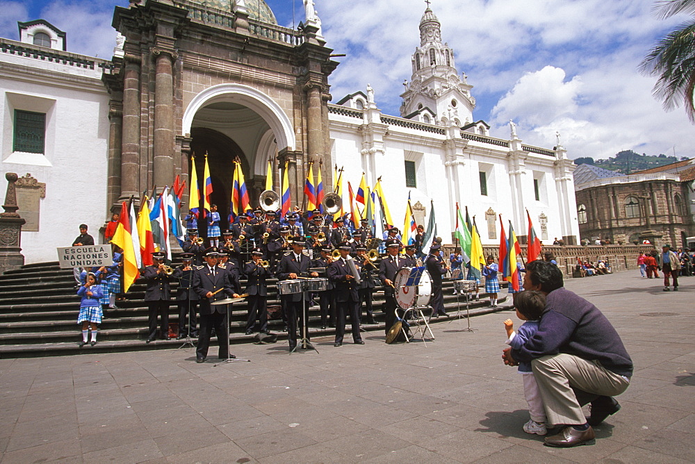 Plaza de Independencia the heart of the Old Colonial Center, with a band concert in front of the Cathedral, Quito, Ecuador