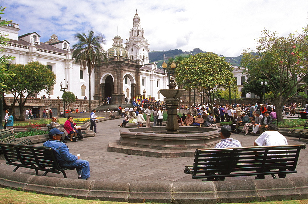 Plaza de Independencia the heart of the Old Colonial Center with fountains and gardens and the Cathedral beyond, Quito, Ecuador