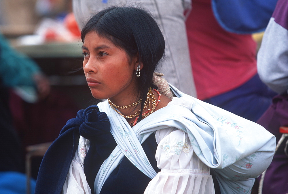 Otavalo north of Quito is one of Latin Am's most famous markets for textiles, crafts and produce portrait of Otavalo girl food vendor, Quito, Ecuador