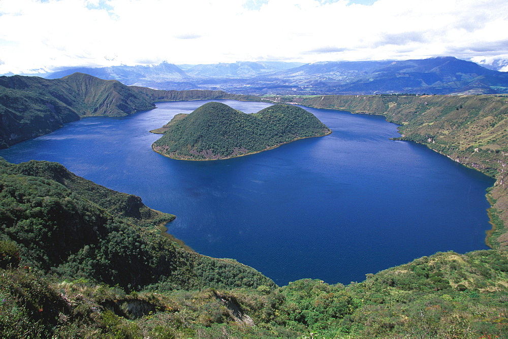 Laguna Cuicocha nestles in the crater of an extinct volcano above the town of Cotacachi and an easy excursion north of Otavalo, North of Quito, Highlands, Ecuador