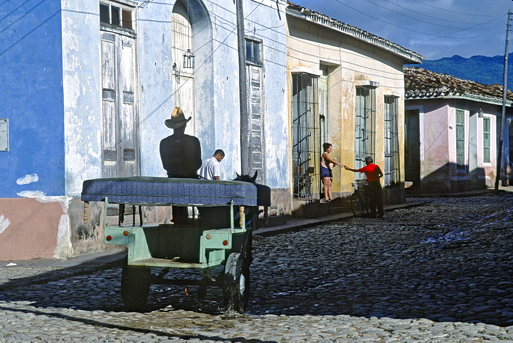 Horse cart (frequently used transportation because of gas shortage) on street in town of Trinidad in Sancti Spiritus Province, Trinidad, Cuba