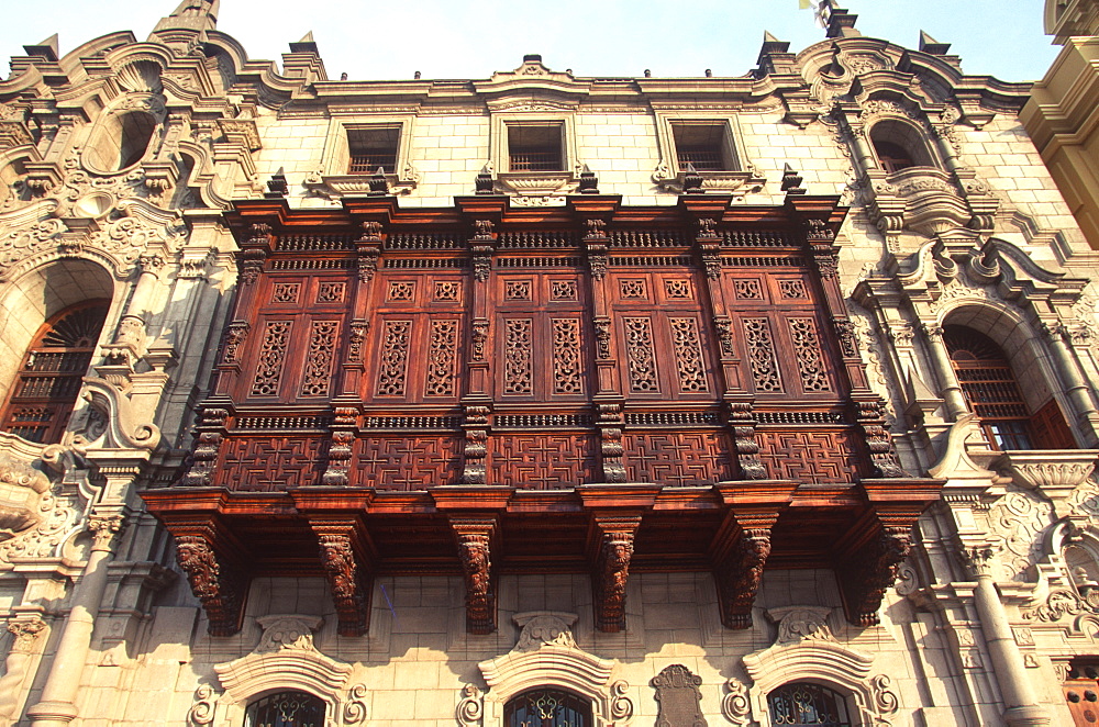 The Archbishop's Palace with beautiful carved wooden balconys next to the Cathedral on the Plaza de Armas, Colonial Architecture, Lima, Peru