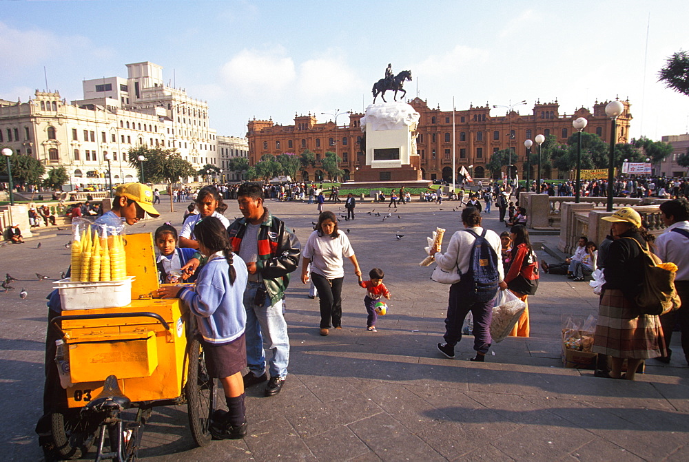 Plaza San Martin, with a statue of San Martin Peru's Independence Hero, it is the hub of the modern city icecream vendor and buyers, Lima, Peru