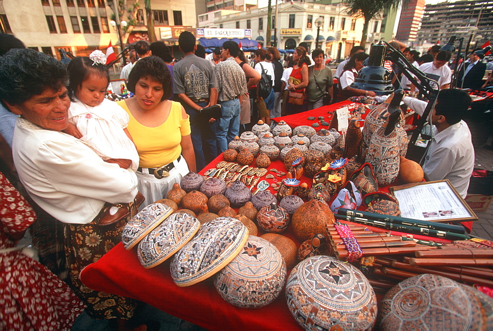 Parque Central, popular gathering spot in busy suburb with upscale banks and shops a street market with traditional crafts, Lima, Peru