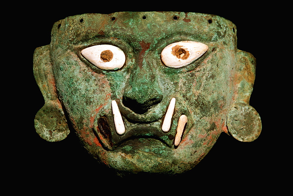 Mochica Culture, 200-800AD, Classic Period supreme feline deity mask in copper and bone Museo Rafael Herrera collection, Lima, Peru