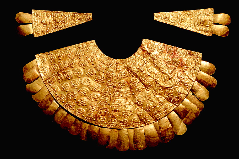 Gold Artifacts Chimu Culture, 1000-1400AD NCoast gold breastplate (pectoral) and two epaulets in the Rafael Herrera Museum, Lima, Peru