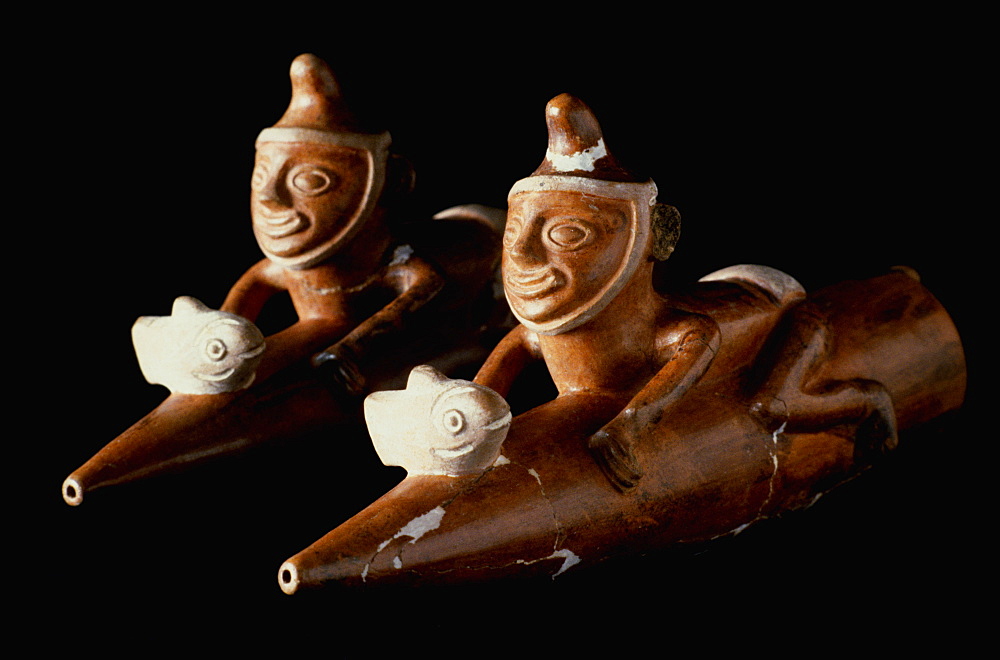 Precolumbian Ceramics Mochica (Moche) Culture 100-700AD fishermen riding on 'Totora' traditional reed boats in the collection of the Museo Amano, Lima, Peru