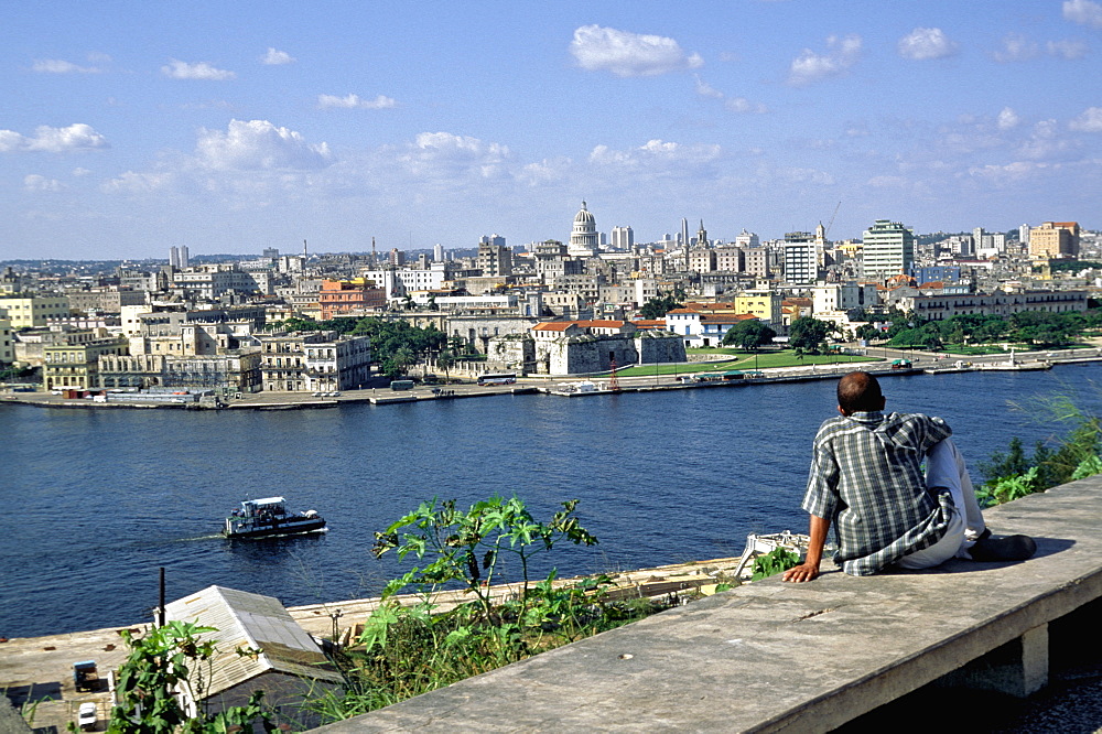 A view of Havana's skyline across the harbor from the battlements of the Forteleza de San Carlos de la Cabana in Casablanca area, Habana Vieja, Havana, Cuba