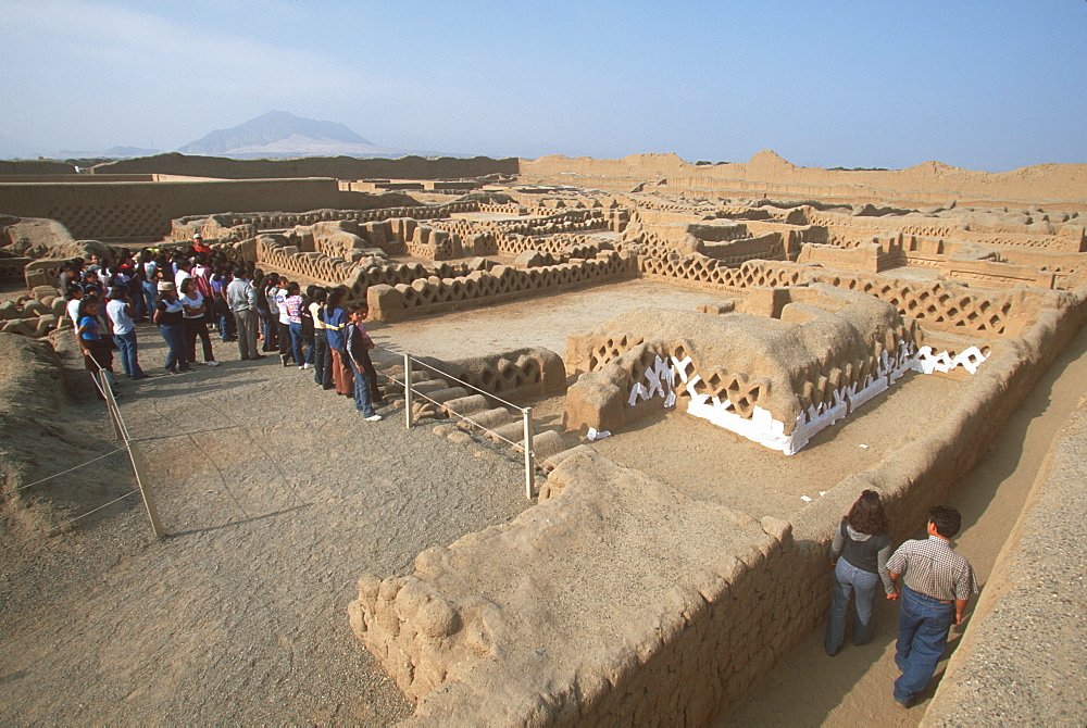 Chimu Culture Chan Chan, 1300-1468AD, capital of empire and world's largest adobe city covering 20 sqkm near Trujillo students in Palacio Tschuldi, Peru