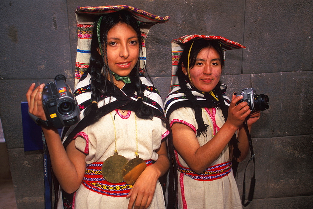 Coricancha or Inca Sun Temple within the walls of Santo Domingo Church reenactment of Inca ceremony with mamaconas (chosen women), Cuzco, Peru