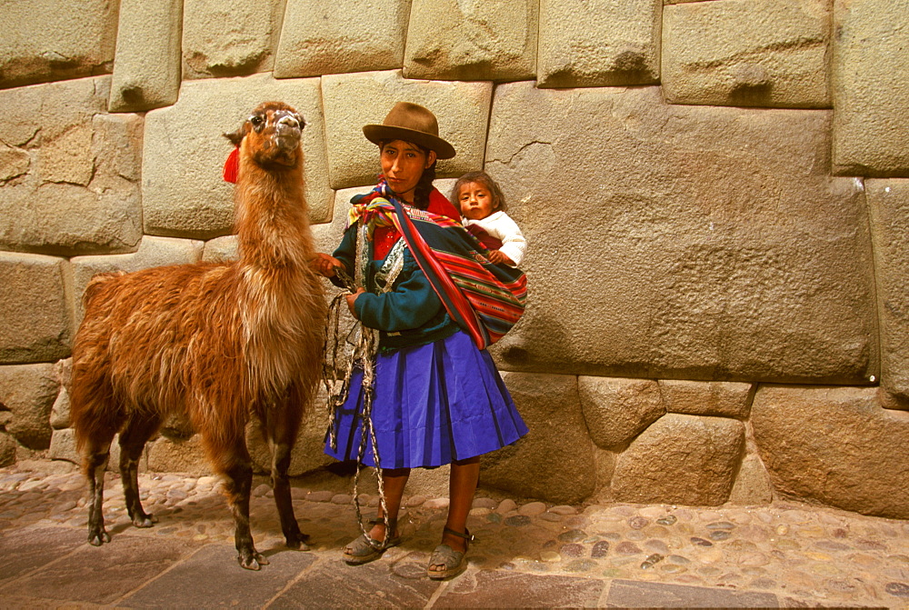 Calle Hatunrumiyoc near the Plaza de Armas contains some of the finest Inca stonework including the famous twelve sided stone, Cuzco, Highlands, Peru