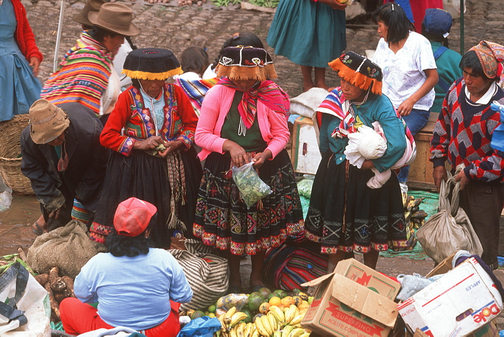 Pisac Village in the Valley of the Incas Sunday Market, one of the world's most colorful craft and produce markets, Cuzco area, Highlands, Peru