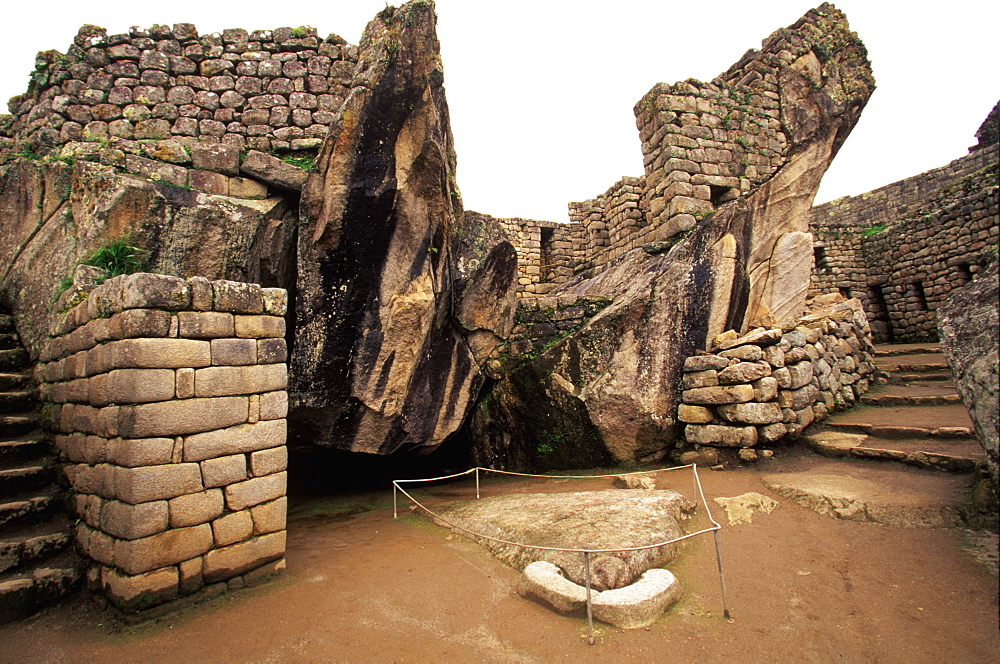 Machu Picchu the Prison Group with a carved stone forming the head of a condor and natural stones forming the wings, Highlands, Peru