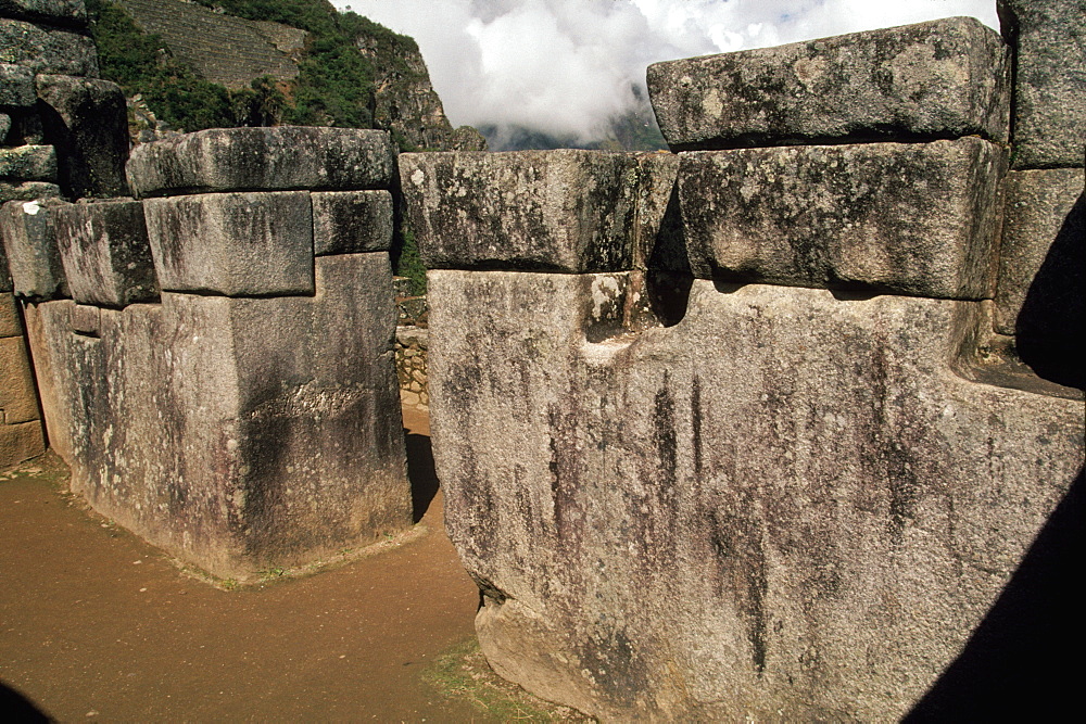 Machu Picchu the Sacristy, a small room off the Principal Temple in the Sacred Area, is reknown for a large stone cut with 32 corners, Highlands, Peru