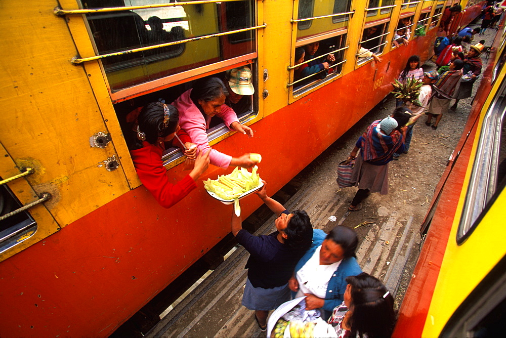 One of the world's most famous train rides thru the Inca Sacred Valley between Cuzco and Machu Picchu vendors and passengers, Peru