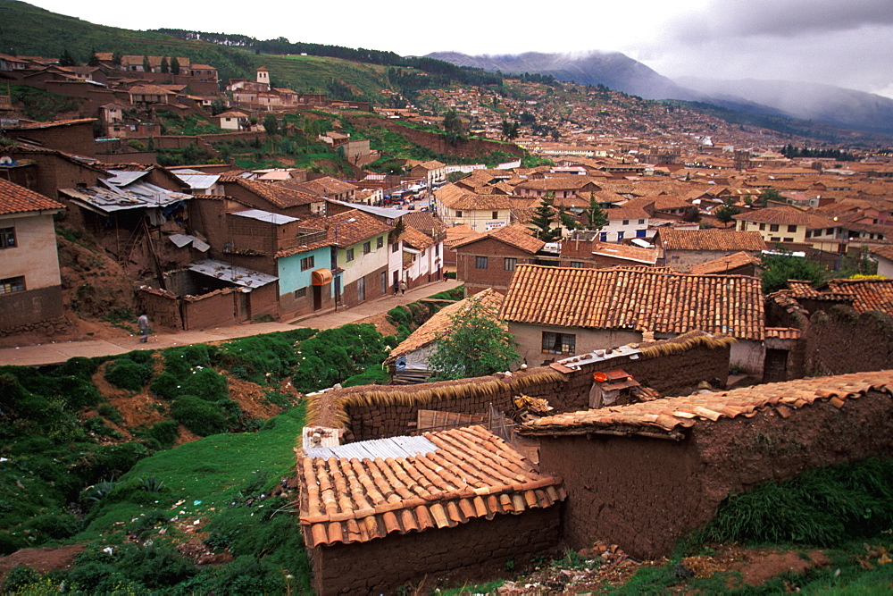 One of the world's most famous train rides thru the Inca Sacred Valley between Cuzco and Machu Picchu passing Cuzco rooftops, Peru